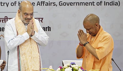 File photo: Union Home Minister Amit Shah with Uttar Pradesh CM Yogi Adityanath during the 26th meeting of the central zonal council, Bastar. (PTI Photo)