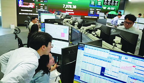 World shares mostly gain as investors watch Trump-Xi summit