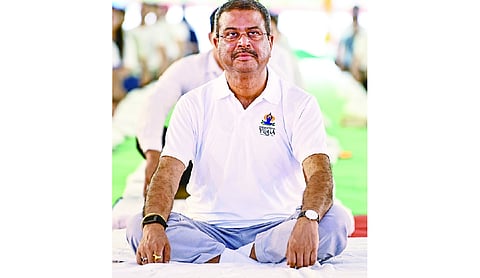 Yoga offers solutions to global health challenges: Pradhan at DU event