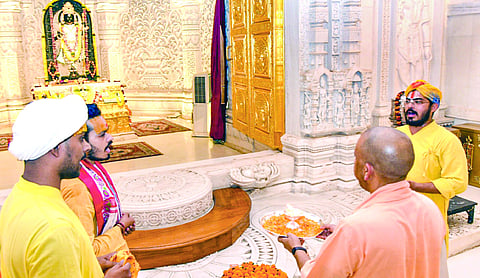 Yogi seeks to ease temple tensions