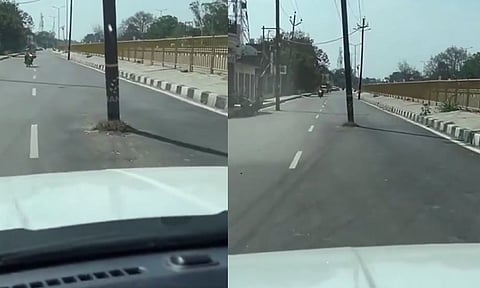 சாலையின் நடுவே மின்கம்பம்... வாகன ஓட்டிகள் அதிர்ச்சி - வைரல் வீடியோ