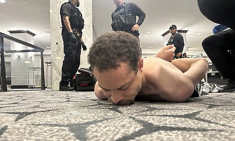 விருந்து நிகழ்ச்சியில் துப்பாக்கிசூடு: கைதான நபரின் படத்தை சமூக வலைதளத்தில் பதிவிட்ட டிரம்ப்