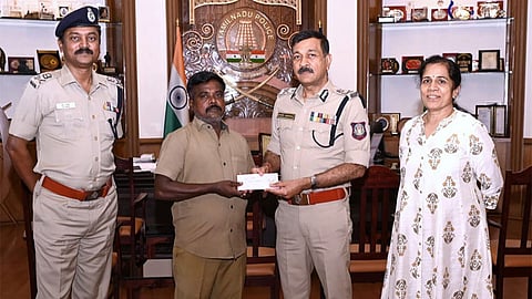 ஆட்டோ ஓட்டுநர் முருகன்