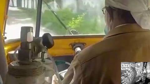 auto driver with oxygen cylinder