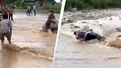 காட்டாற்று வெள்ளத்தில் சிக்கிய வாகன ஓட்டி - வைரல் வீடியோ

