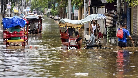 அசாமில் கனமழை, வெள்ளம்: பலி எண்ணிக்கை 66 ஆக உயர்வு

