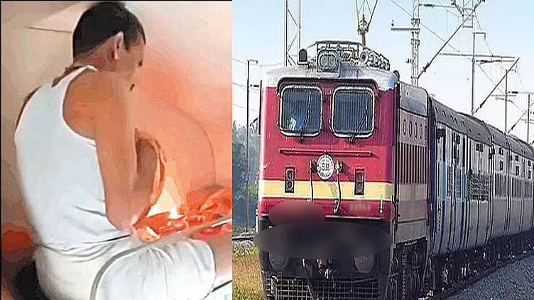 ஏ.சி. ரெயில் பெட்டியில் விளக்கேற்றி சாமி கும்பிட்ட பயணி