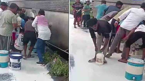 சாலையில் கவிழ்ந்த பால் டேங்கர்: போட்டி போட்டு பாத்திரங்களில் பாலை பிடித்து சென்ற மக்கள்.