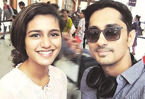 கண் சிமிட்டி பிரபலமான பிரியா வாரியருடன் நடிகர் சித்தார்த் சந்திப்பு