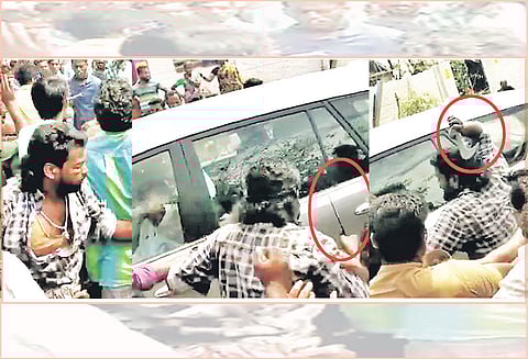 புயல் பாதித்த பகுதிகளுக்கு சென்றபோது அமைச்சர் ஓ.எஸ்.மணியனை வெட்ட அரிவாளுடன் பாய்ந்த வாலிபர் சமூக வலைதளங்களில் பரவும் வீடியோவால் பரபரப்பு