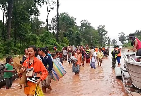 லாவோஸ் நாட்டில் அணை உடைந்தது: வெள்ளத்தில் சிக்கி 20 பேர் சாவு