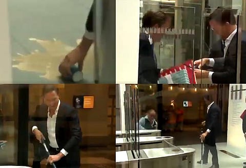 பாராளுமன்றத்தில் தரையில் தான் சிந்திய காபியை சுத்தம் செய்த நெதர்லாந்து பிரதமர்!