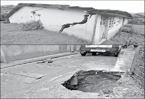 தொடர் மழையால் ஊட்டி ரெயில்வே குடியிருப்பு பகுதியில் மண் சரிவு - சாலையில் திடீர் பள்ளம்