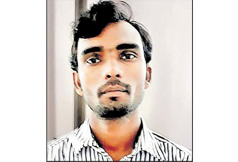 கள்ளக்காதலியை கழுத்தை அறுத்து கொன்ற வாலிபர் கைது