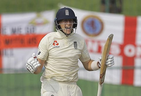 இலங்கைக்கு எதிரான டெஸ்ட்: ஜோ ரூட் சதத்தால் சரிவை சமாளித்தது இங்கிலாந்து