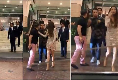 பெண்கள் கழிவறைக்குள் செல்ல அனுமதிக்காததால் துப்பாக்கியை காட்டி மிரட்டிய எம்பியின் மகன்