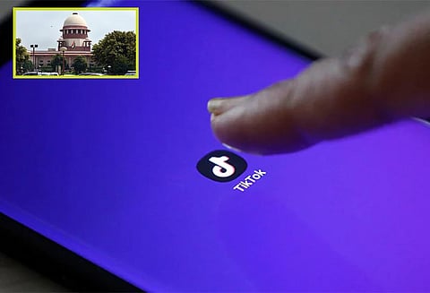 ‘டிக்டாக்’ செயலி மீதான இடைக்கால தடை குறித்த வழக்கு: மதுரை ஐகோர்ட்டு நாளை முடிவு எடுக்கவேண்டும் - சுப்ரீம் கோர்ட்டு உத்தரவு