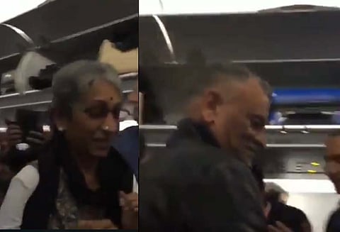 இந்திய விமானி அபிநந்தனை வரவேற்க சென்ற பெற்றோரை எழுந்து நின்று கைதட்டி வரவேற்ற பயணிகள்-வீடியோ