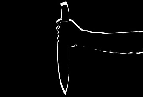 தாயின் தலையை துண்டாக வெட்டி பூஜை செய்த மகன்