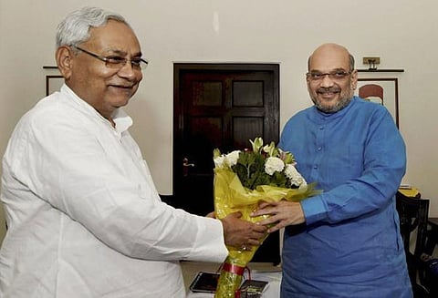 தேசிய ஜனநாயக கூட்டணியில் இணையுமாறு நிதிஷ் குமாருக்கு அமித் ஷா அழைப்பு