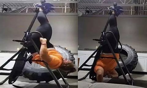 ஜிம்மில் தலைகீழாக சிக்கி வவ்வால் போல் தொங்கிய பெண்... கைகொடுத்த ஸ்மார்ட் வாட்சு