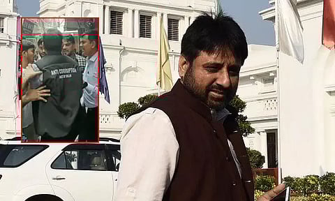 லஞ்ச ஒழிப்பு அதிகாரியை தள்ளி விட்ட விவகாரம்: ஆம் ஆத்மி எம்.எல்.ஏ. ஆதரவாளர்கள் மீது பாய்ந்தது வழக்கு