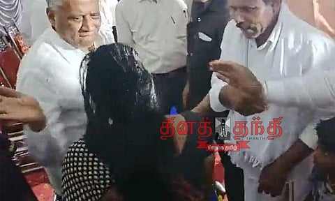 பெண்ணை கன்னத்தில் அறைந்த பா.ஜனதா மந்திரி; சமூக வலைத்தளங்களில் வீடியோ வைரல்