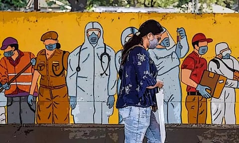 கர்நாடகாவில் உள் அரங்குகளில் முக கவசம் அணிவது கட்டாயம்; அரசு அறிவிப்பு