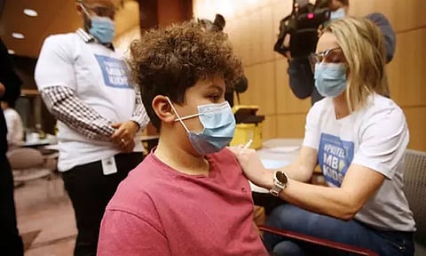 அமெரிக்கர்களுக்கு ஆண்டுக்கு ஒரு முறை கொரோனா பூஸ்டர் டோஸ் பரிந்துரை