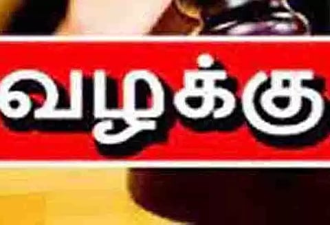 வாலிபரை பாட்டிலால் குத்தியவர் மீது வழக்கு