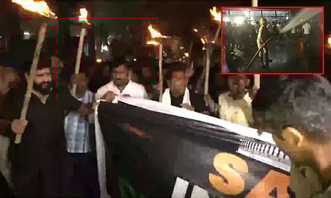 ராகுல் காந்தி விவகாரம்: தீப்பந்தம் ஏந்தி காங்கிரசார் போராட்டம்; தண்ணீர் பீய்ச்சி அடித்து விரட்டிய போலீசார்