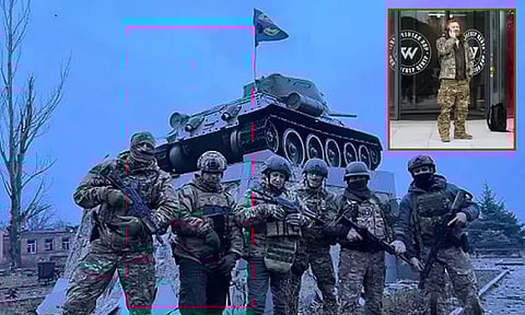 உக்ரைனின் பாக்முத் நகரை கைப்பற்றிய ரஷிய கூலிப்படை அமைப்பு; கொடியையும் நாட்டியது