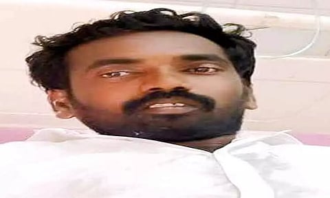 போலீஸ் நிலையத்தில் விஷம் குடித்த வாலிபர்