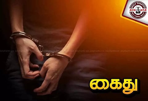 வாலிபரை தாக்கியவர் கைது