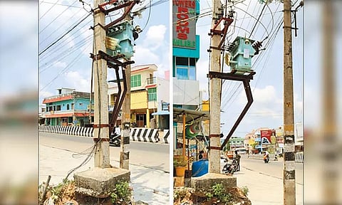 சாலை விரிவாக்க பணிக்காக தோண்டப்பட்ட பள்ளத்தால் ஆபத்தான முறையில் சாயும் நிலையில் காட்சியளிக்கும் டிரான்ஸ்பார்மர்