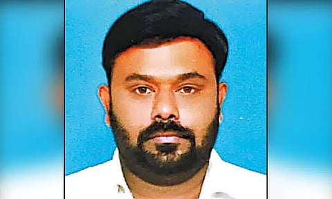 போலி ஆவணம் மூலம் ரூ.2 கோடி நிலம் மோசடி; வாலிபர் கைது - மற்றொருவருக்கு வலைவீச்சு