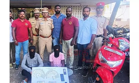 நகை வியாபாரியிடம் பணம் பறித்த 2 பேர் கைது