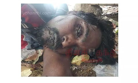 சாராய கடை அருகே இறந்து கிடந்த வாலிபர்