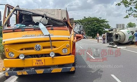 லாரி மோதி மற்றொரு லாரி கவிழ்ந்தது