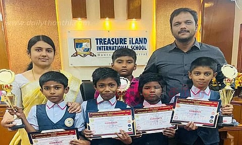 யோகா போட்டியில் சாதனை படைத்த மாணவர்களுக்கு பாராட்டு