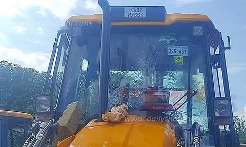 ஆக்கிரமிப்புகளை மீட்க சென்ற வனத்துறையினருடன் விவசாயிகள் வாக்குவாதம்