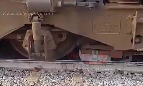 தண்டவாளத்தில் படுத்து உயிர் தப்பிய தலைமை ஆசிரியர்