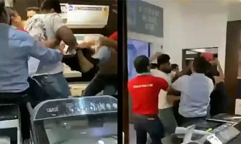 ஐ-போனை வழங்க தாமதம்: கடை ஊழியருக்கு அடி-உதை; இருவர் கைது