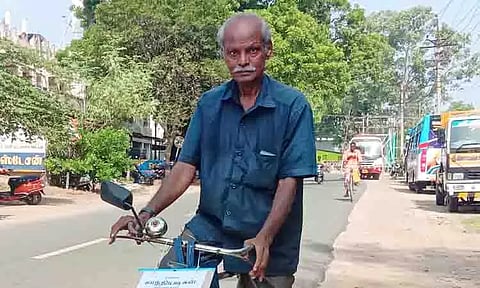 பஸ் கட்டணத்தை குறைக்க வலியுறுத்தி மெக்கானிக் சைக்கிள் பயணம்