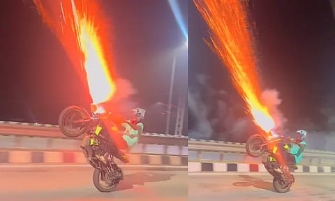 பைக்கில் பட்டாசு வெடித்துக்கொண்டே வீலிங் செய்த இளைஞர் - அதிர்ச்சி வீடியோ