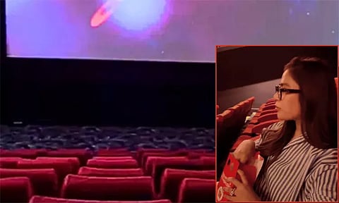 அனைத்து டிக்கெட்டுகளையும் மொத்தமாக வாங்கி தியேட்டரில் தனியாக படம் பார்த்த பெண்