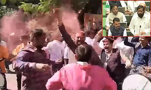 மசோதா நிறைவேறியதும் சட்டமன்றத்திற்கு வெளியே கொண்டாட்டத்தில் ஈடுபட்ட மக்கள்.