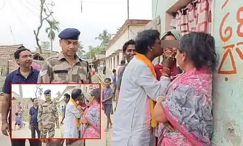 பெண்ணுக்கு முத்தம் கொடுத்த பா.ஜ.க. எம்.பி.... பிரசாரத்தில் சர்ச்சை