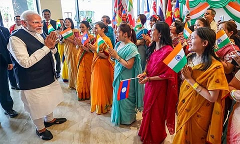 Prime Minister Narendra Modi being welcomed by the Indian community, in Vientiane, Laos