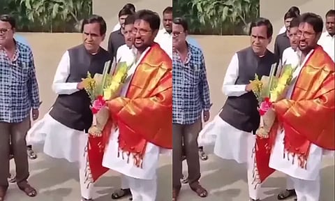 பா.ஜ.க. தொண்டரை காலால் உதைத்த முன்னாள் மத்திய மந்திரி; வைரலான வீடியோ